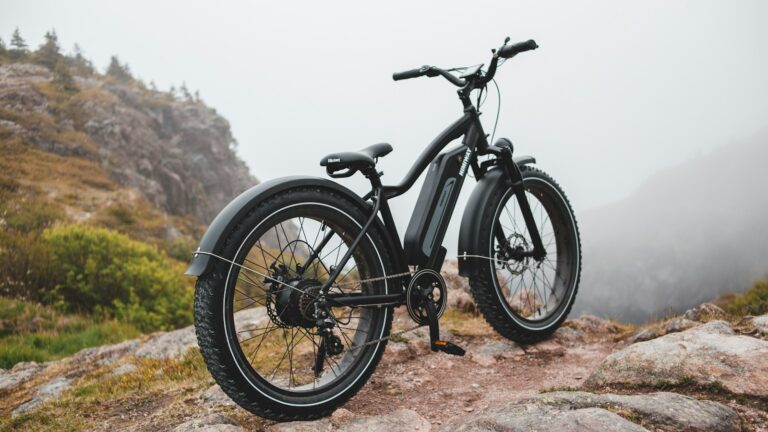 black and gray mountain bike on brown ground during daytime